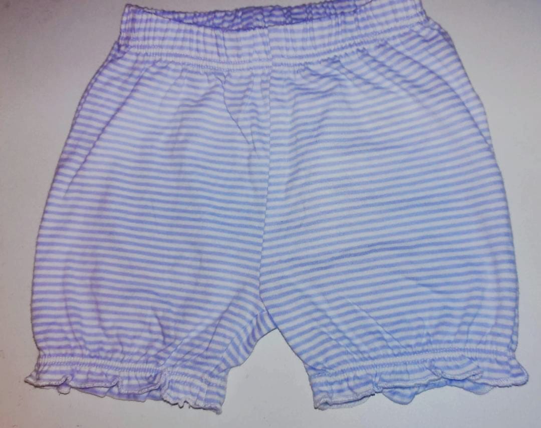 SHORT RAYAS CELESTE/BLANCO YAMP